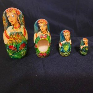 Wooden Russian Nesting Dolls Matryoshka Hand-Painted and Carved Set of 4